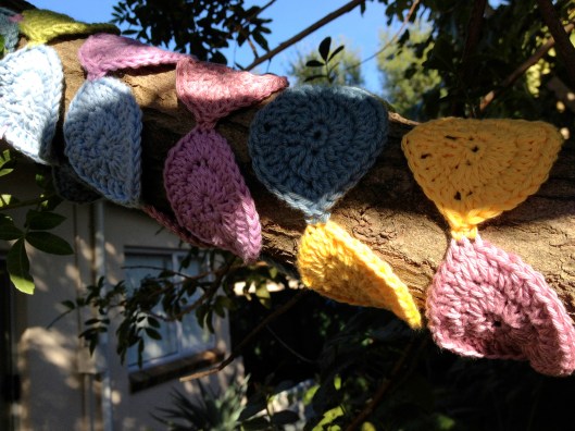 Tree yarnbomb with crochet circles