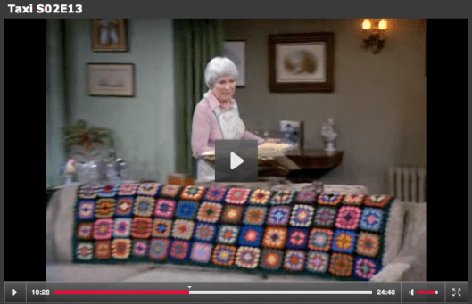 Taxi crochet afghan on couch