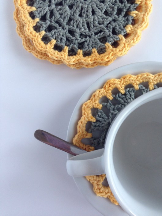 yellow and grey crochet coasters
